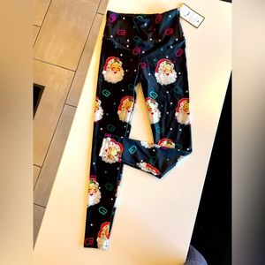 Goldsheep brand Christmas CycleBar leggings with Santa Claus.